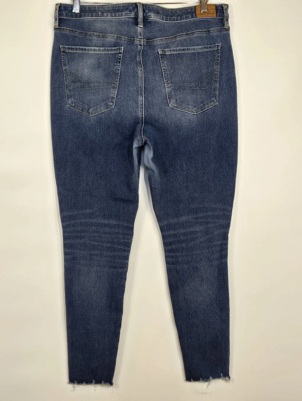 American Eagle Dream Super Hi-Rise Jegging Jeans  Distressed Raw Hem 16